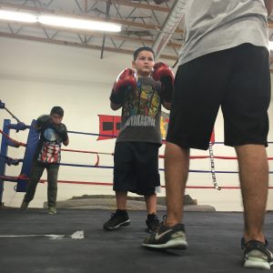Photo/Anthony Victoria: Julian Serna, 8, training at the Cops4Kids gym in Colton. 