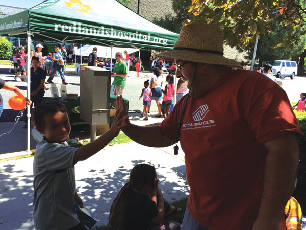 courtesy photo/yazmin alvarez Boys & Girls Clubs of Greater Redlands-Riverside’s CEO P.T. McEwin joined in on the fun during last year’s “Day for Kids” celebration. This year’s event is planned for Sept. 17. 