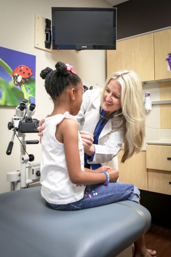Children's-Fund-doc-with-kid