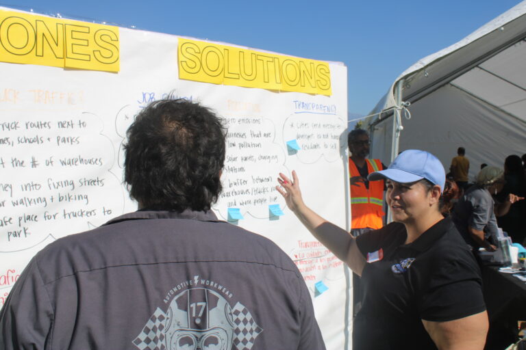 A community activist providing resources at BBQ event
