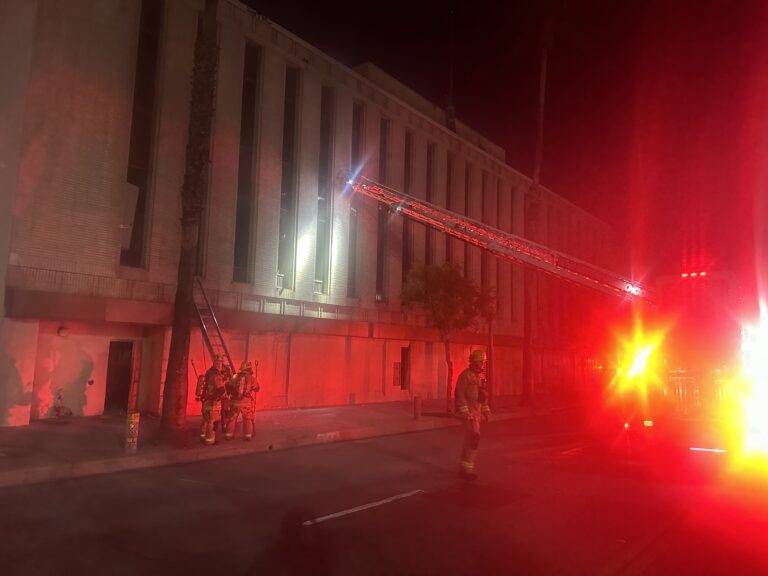 A commercial building fire being contained