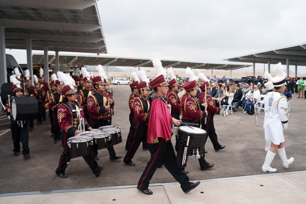A band marching into an event.